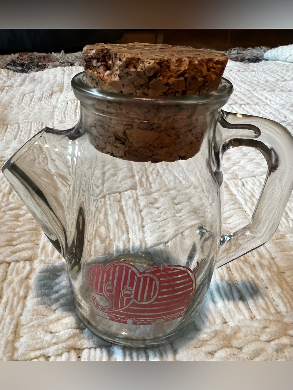 Snub nose pitcher from 50’s with elephant and cork top.
